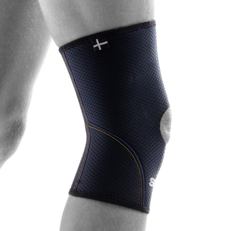 SRX knee protector with open kneecap for stability and compression