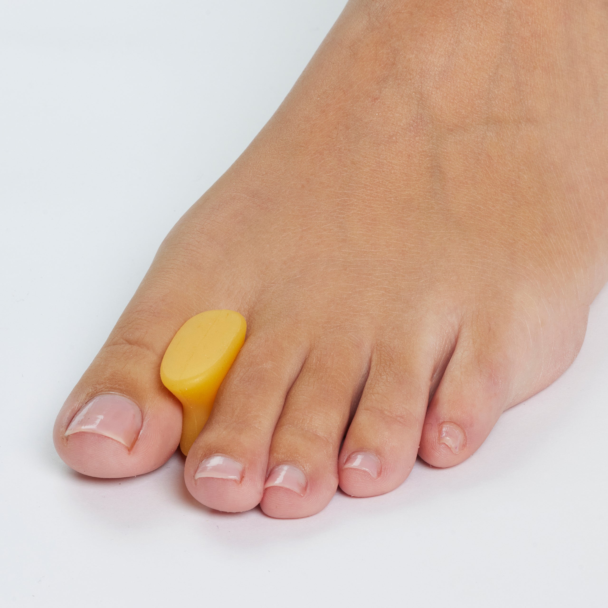 Tåspreder i gel til hallux valgus og tætsiddende tæer