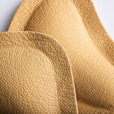 Självhäftande pelotter för avlastning av nedsjunket främre fotvalv