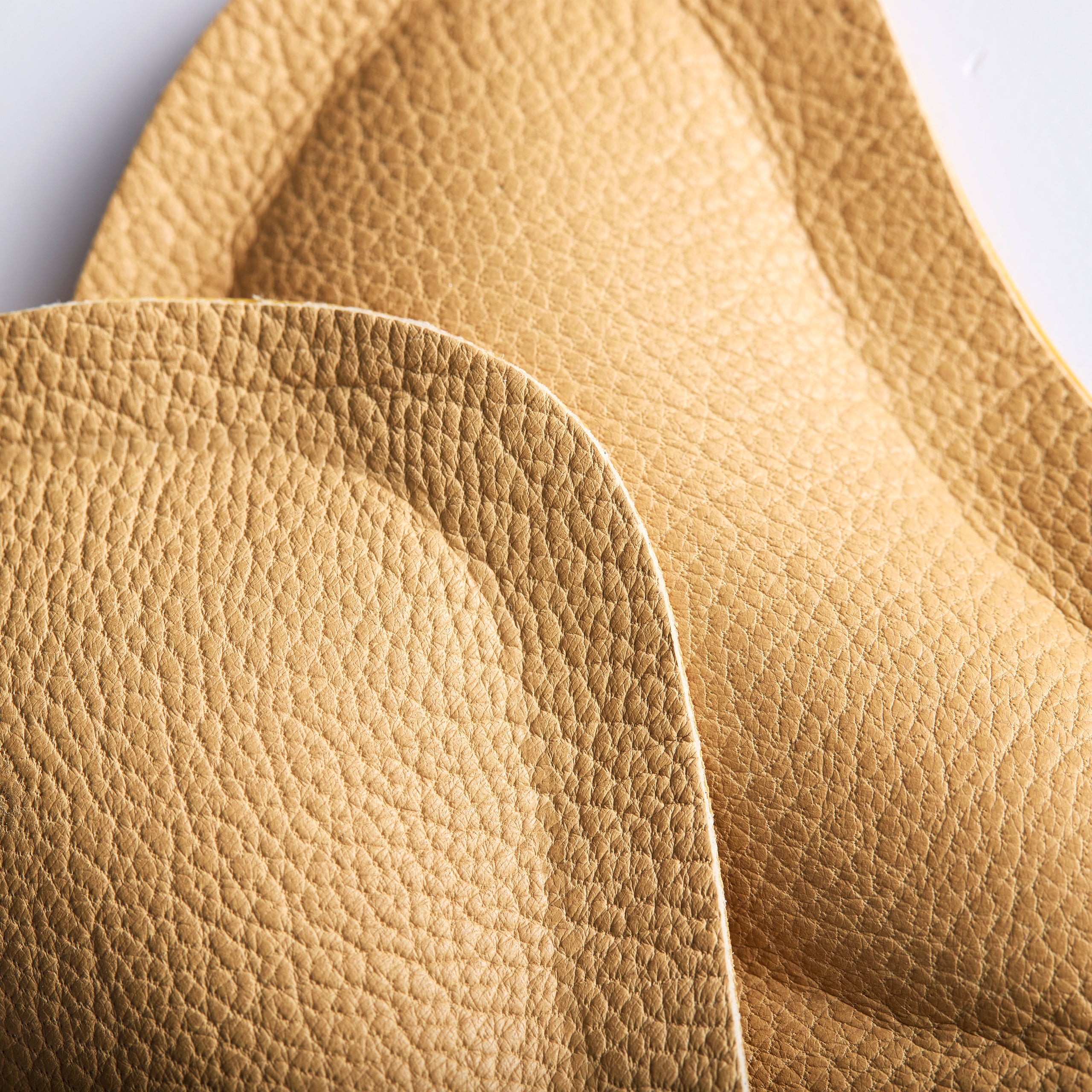 Självhäftande pelotter för avlastning av nedsjunket främre fotvalv