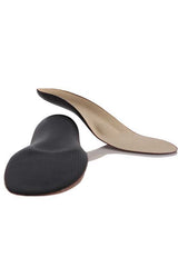 Shoe inserts with pads that provide arch support and pressure relief