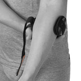 Elbow strap with adjustable pad for tennis and golf arm